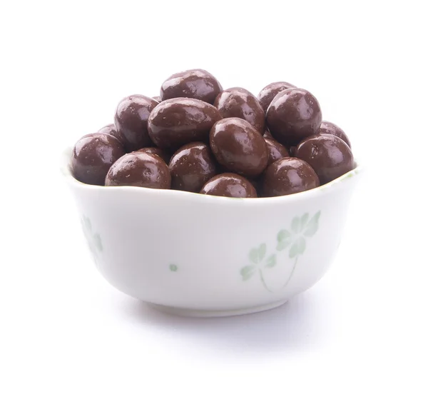 Bola coklat. bola cokelat dalam mangkuk di latar belakang — Stok Foto