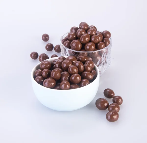 Chocolade ballen. chocolade ballen in kom op een achtergrond — Stockfoto