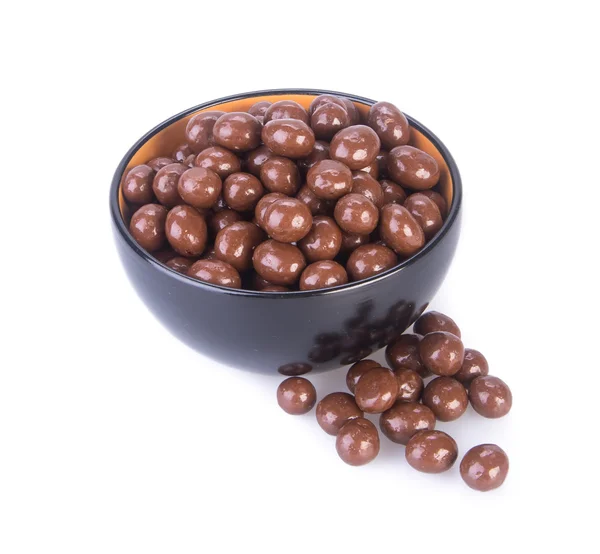 Bolas de chocolate. bolas de chocolate na tigela em um fundo — Fotografia de Stock