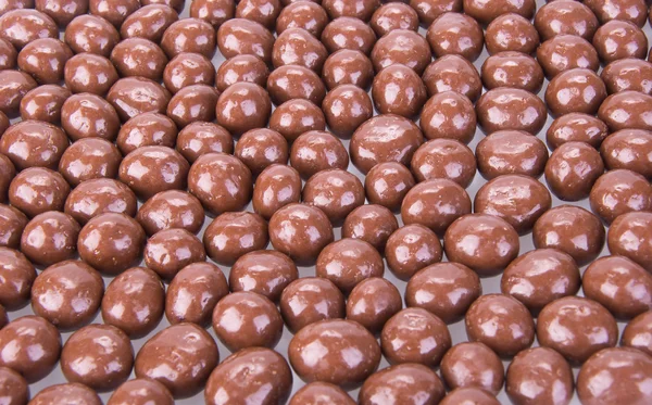 Csokoládé labdák. csokoládé golyó egy háttérben — Stock Fotó
