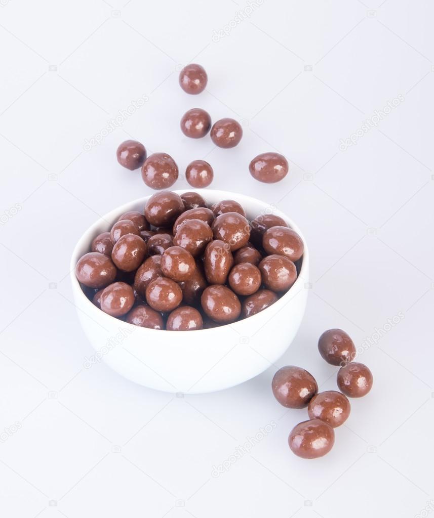 chocolate balls. chocolate balls in bowl on a background