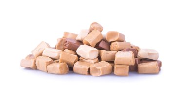 şekerler. karamel şekerler. karamelli şeker bir arka plan üzerinde. enesen