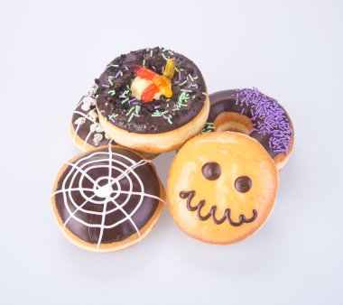 çörek. Halloween donut arka planda
