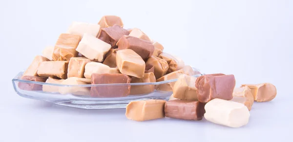 Caramelos. dulces de caramelo. caramelos de caramelo sobre un fondo. caram — Foto de Stock