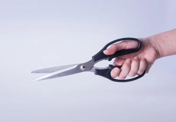 Nůžky. nůžky s rukou na pozadí. nůžky na pozadí — Stock fotografie