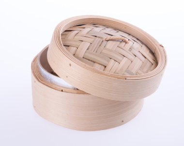 Bambu vapur veya arka plan üzerinde dim sum vapur.