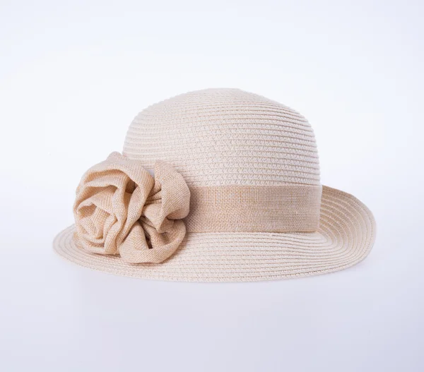 Sombrero para dama o sombrero de paja bonita con flor . — Foto de Stock