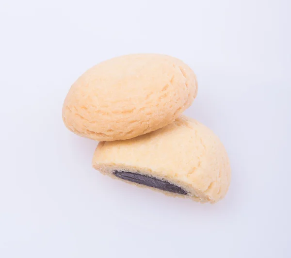 Soubory cookie nebo soubory cookie máslo, bílá čokoláda na pozadí. — Stock fotografie