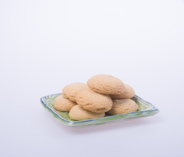 tanımlama bilgilerini veya bir arka plan üzerine tereyağlı kurabiye.