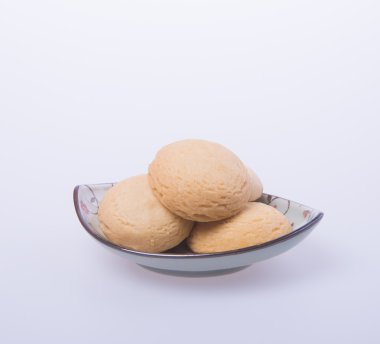 tanımlama bilgilerini veya bir arka plan üzerine tereyağlı kurabiye.