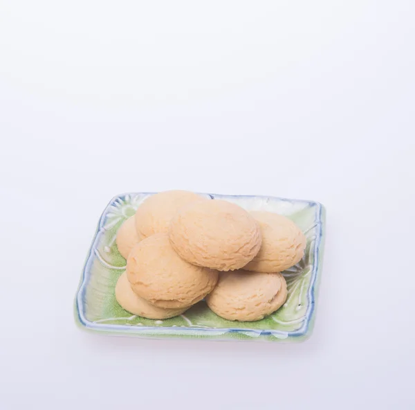 Soubory cookie nebo soubory cookie máslo na pozadí. — Stock fotografie