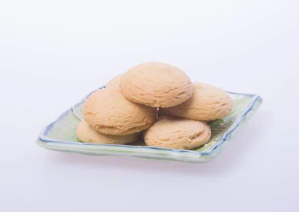 Cookies ou biscuits au beurre sur un fond . — Photo