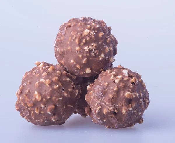 Bola coklat atau coklat bonbon di latar belakang . — Stok Foto