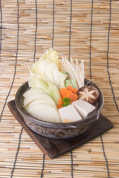 Japanese cuisine. hot pot on the background — Stock Photo, Image