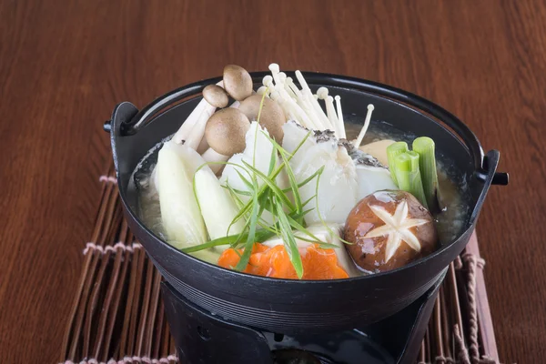 Japanese cuisine. hot pot on the background — Stock Photo, Image