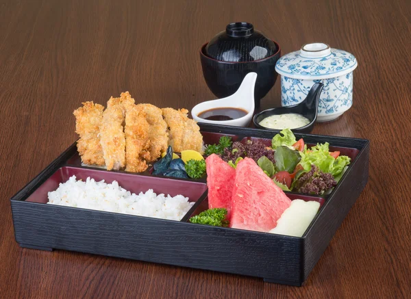 japanese cuisine. lunch box set on the background