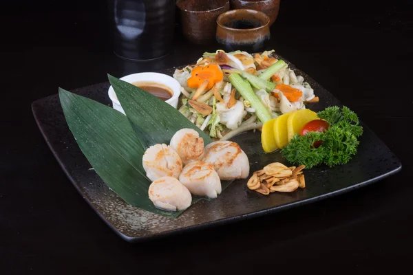 Japanese cuisine. grilled shell fish on the background — Stock Photo, Image