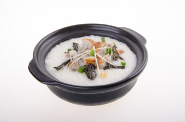geleneksel Çin domuz lapası pirinç yulaf çorbası claypot görev yaptı.