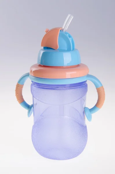 Baby bottle, baby bottle on background — Stock Photo, Image