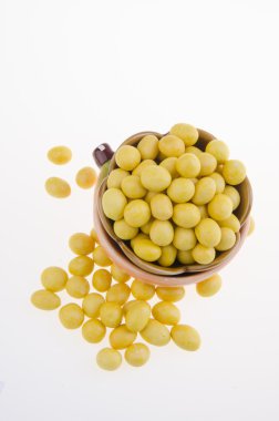 Peanutes veya arka plan üzerinde çıtır kaplamalı fıstık.