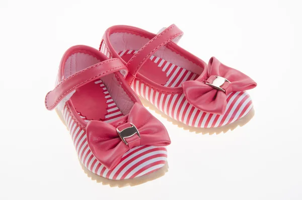 Scarpa o belle scarpe bambina su uno sfondo . — Foto Stock