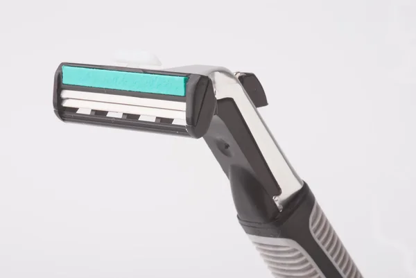Safety shaver or razor on background — Stock Photo, Image