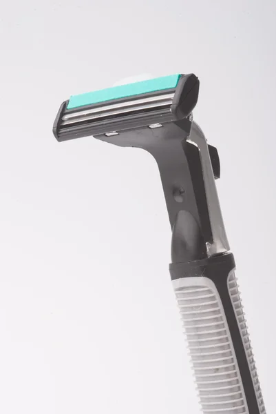 Safety shaver or razor on background — Stock Photo, Image
