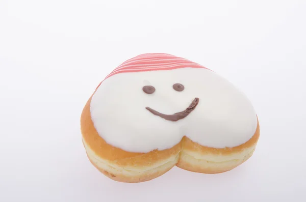 Donut, herzförmiges Gebäck auf Hintergrund — Stockfoto