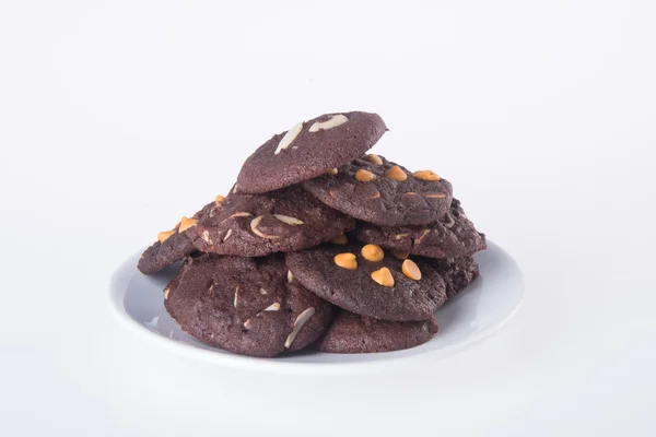 Galletas de chips de chocolate en el fondo —  Fotos de Stock