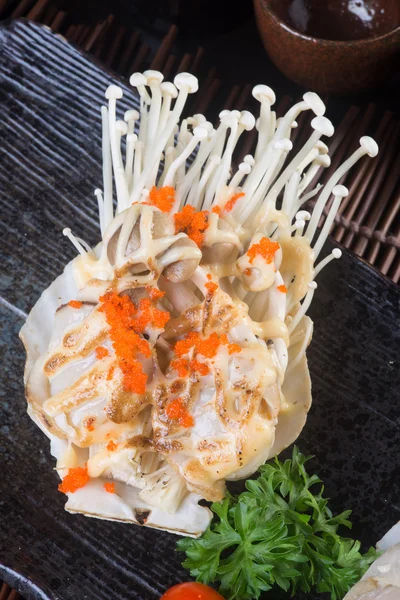 Japanese cuisine. grilled shell fish on the background — Stock Photo, Image