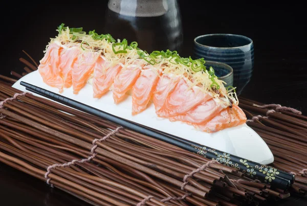 Japansk mat. sashimi på bakgrunden — Stockfoto