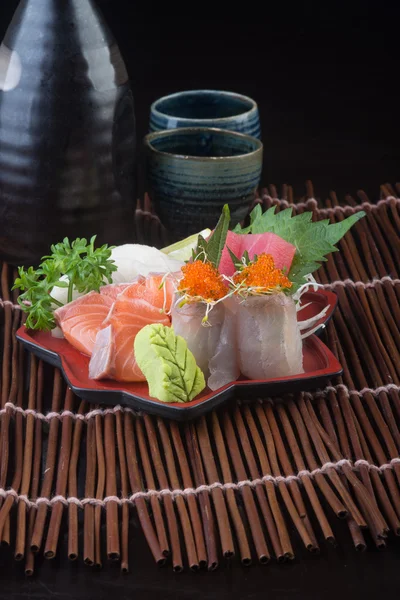Japanese cuisine. sashimi on the background — Stock Photo, Image