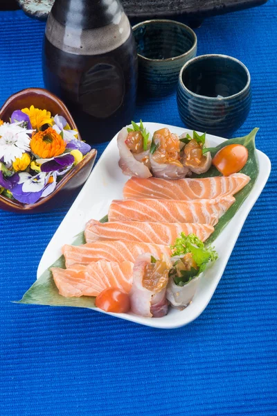 Japanese cuisine. sashimi on the background — Stock Photo, Image