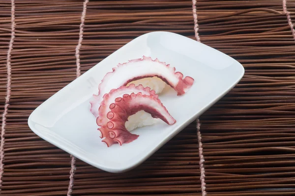 Japanese cuisine. sushi octopus on the background — Stock Photo, Image