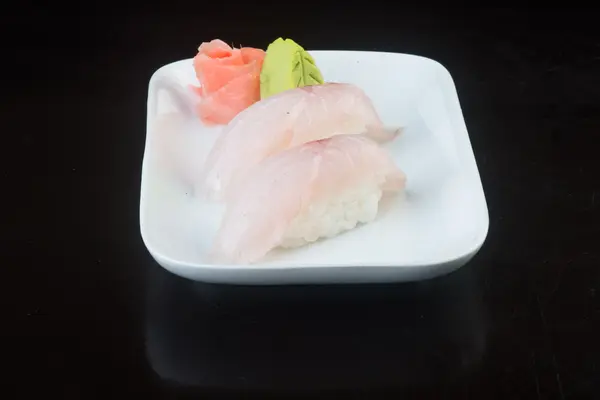 Japanse keuken. sushi op de achtergrond — Stockfoto