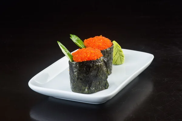 Cocina japonesa. sushi en el fondo — Foto de Stock