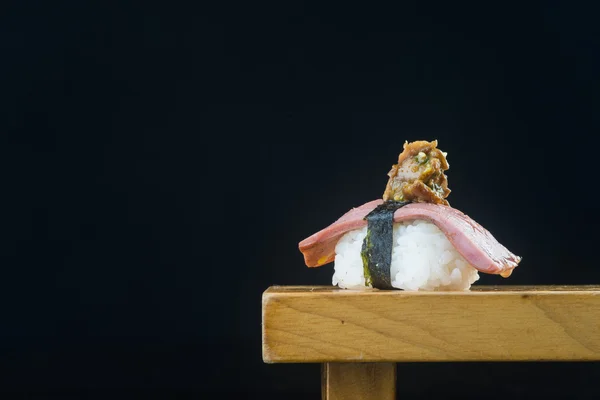 Cocina japonesa. sushi en el fondo — Foto de Stock