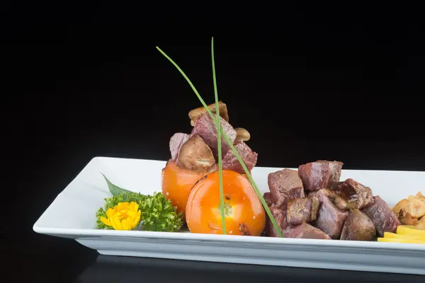 Japanese cuisine. beef cube on the background — Stock Photo, Image