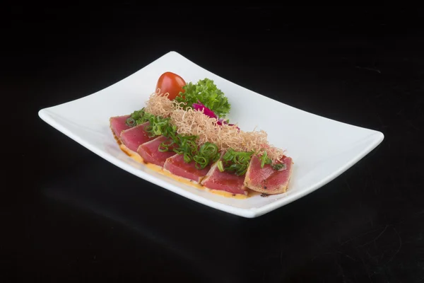 Dania kuchni japońskiej. sashimi na tle — Zdjęcie stockowe
