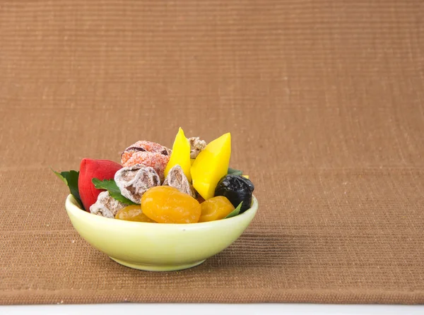 Γλυκά του κουταλιού & αποξηραμένα φρούτα. Σνακ τροφίμων σε φόντο — Stock fotografie