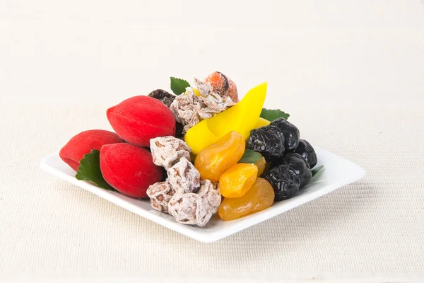 Γλυκά του κουταλιού & αποξηραμένα φρούτα. Σνακ τροφίμων σε φόντο — Stock fotografie