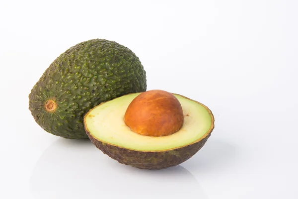 Avocado. Avocado auf einem Hintergrund — Stockfoto