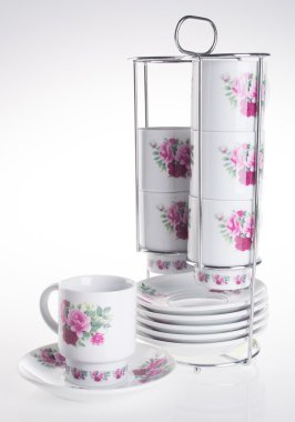 Kupa ayarlar. bir arka plan üzerinde fincan setleri