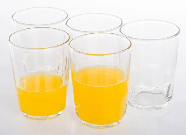 Succo d'arancia su uno sfondo — Foto Stock