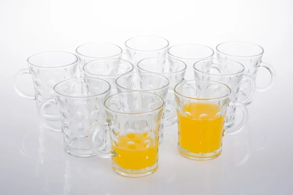 Apelsinjuice på en bakgrund — Stockfoto