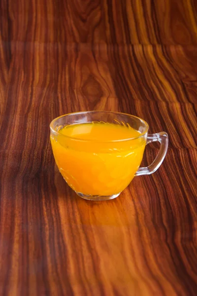 Suco de laranja em um contexto — Fotografia de Stock