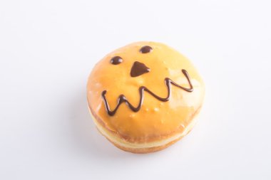 çörek. Halloween donut arka planda