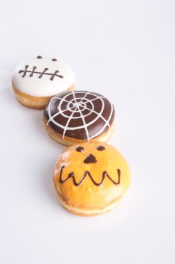 çörek. Halloween donut arka planda