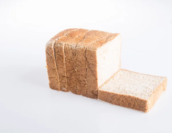 Rebanada de pan sobre un fondo — Foto de Stock