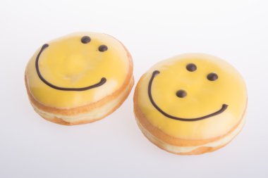 çörek. mutlu yüz donut zemin üzerine